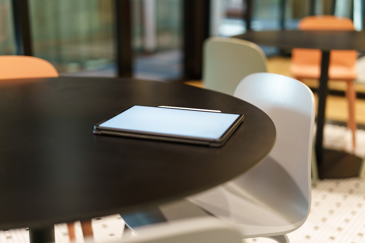 Professional reviewing compliance documentation at desk